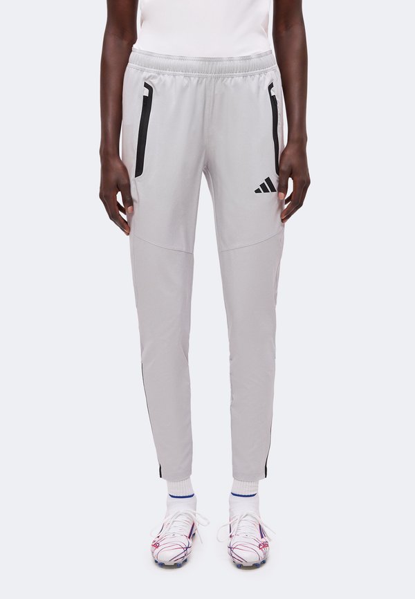 adidas Performance TIRO TRAVEL PANTS - Tracksuit bottoms - team light grey/black