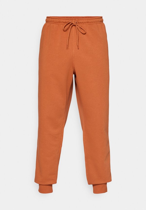 Nike Performance NIKECOURT HERITAGE PANT JOGGER - Tracksuit bottoms - dark russet