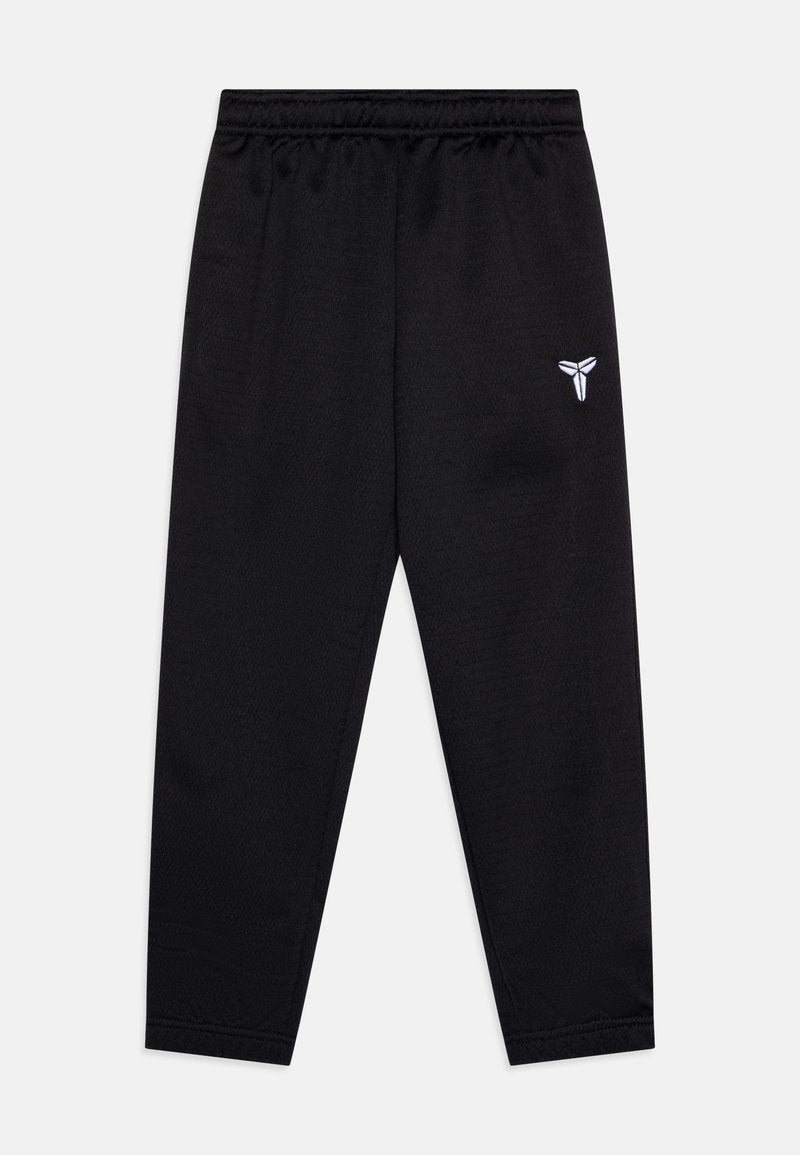 Schwarze Sporthose mit elastischem Bund, aus strukturiertem Stoff und einem kleinen weißen Logo am linken Oberschenkel.