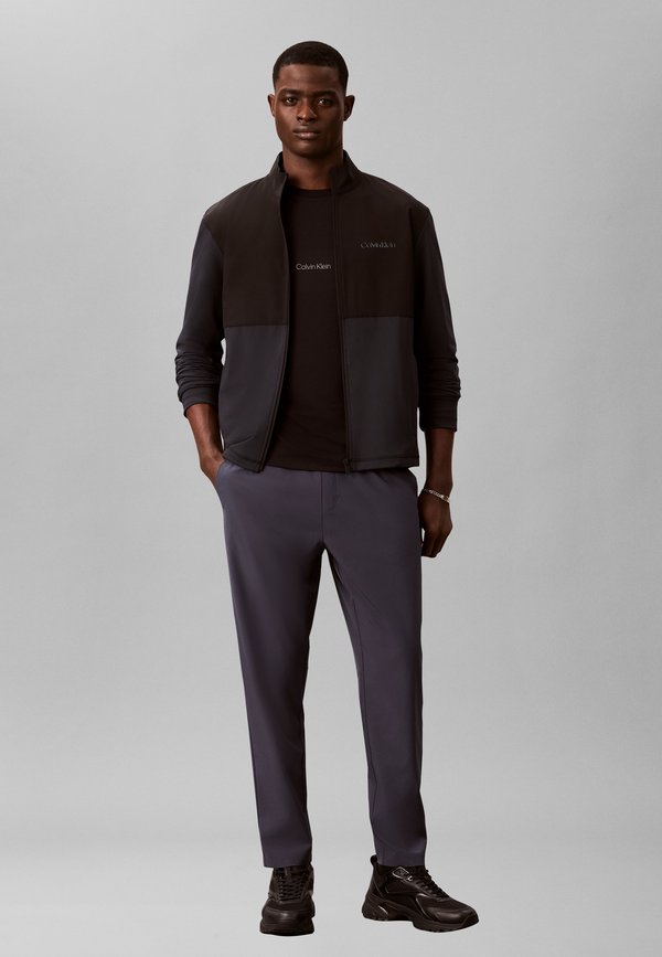 Calvin Klein SPORT PANT UNISEX - Trousers - blue nights