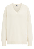 V-Ausschnitt Pullover aus cremefarbener Strickware. Verfügt über lange Ärmel, gerippte Bündchen und Saum sowie ein strukturiertes Muster auf der Brust. Weiches Material.