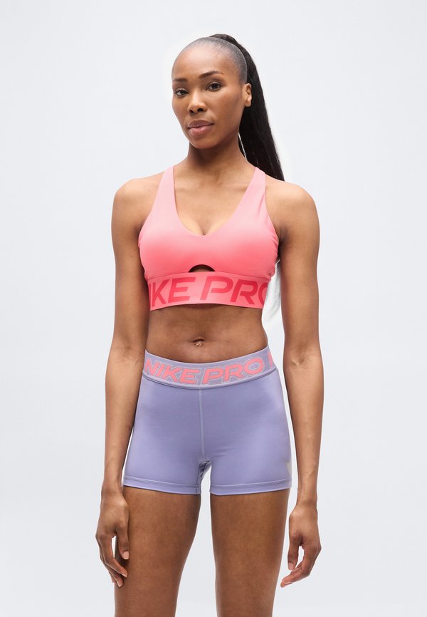 Nike Performance SCULPT BRA - Medium support sports bra - sea coral/bleached coral/white