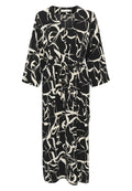 Schwarzes Kleid mit einem weißen abstrakten Muster, lockere Passform, V-Ausschnitt, langen Ärmeln und einem Taillenzug. Aus leichtem Stoff mit glatter Textur gefertigt.