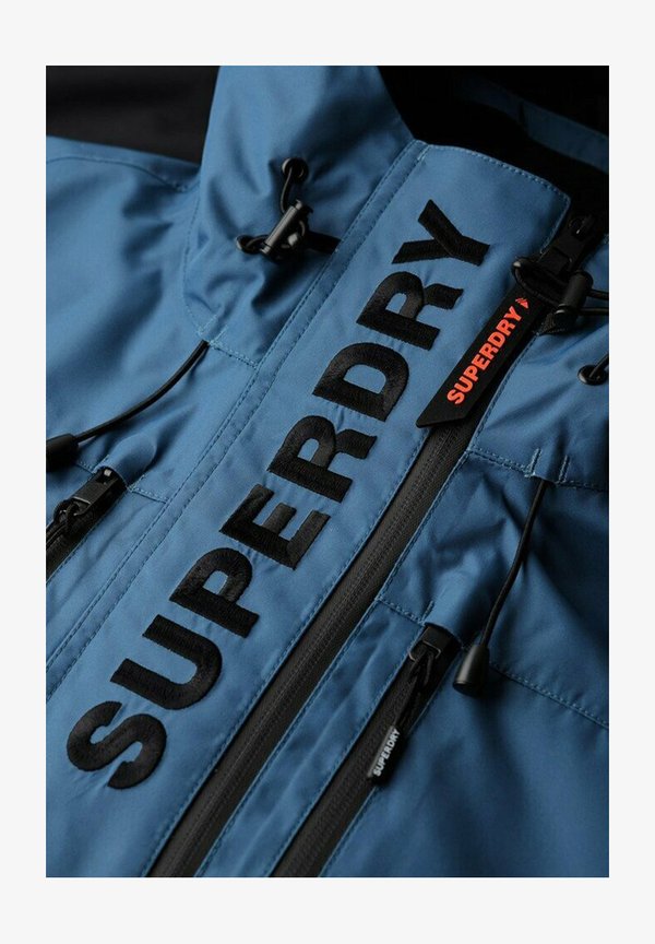 Superdry & Co SUPERDRY ULTIMATE FREESTYLE SKI JACKET.. - Light jacket - dry slate blue