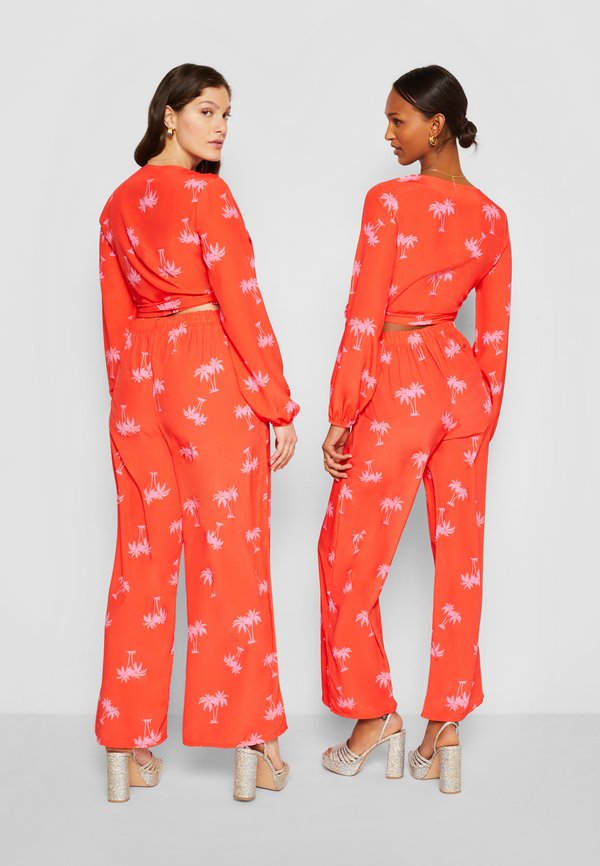 Never Fully Dressed NFDXZLND RORY PALM WRAP TOP