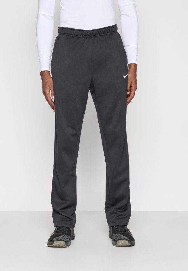 Nike Performance M NK TF REGULAR - Tracksuit bottoms - black/white