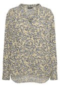 Langärmelige Bluse aus leichtem Crepe-Stoff mit gelbem Grund und blauen sowie schwarzen Blattmustern; runder Ausschnitt und geschwungener Saum.