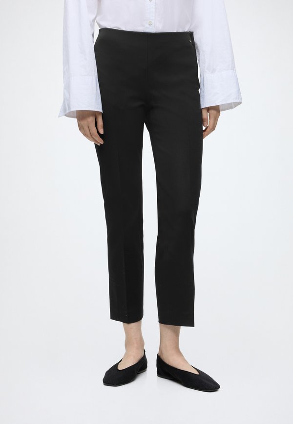 Tommy Hilfiger GABARDINE - Trousers - black