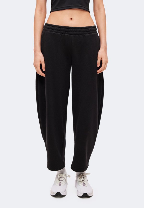 Puma RELAXED BARREL LEG PANTS - Tracksuit bottoms - black
