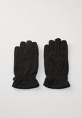 Schwarze Fleece-Handschuhe mit strukturiertem Finish, ausgestattet mit elastischen Bündchen und einem dezenten, am Handgelenk geprägten Logo. Auffälliges Fingendesign für hohe Fingerfertigkeit.