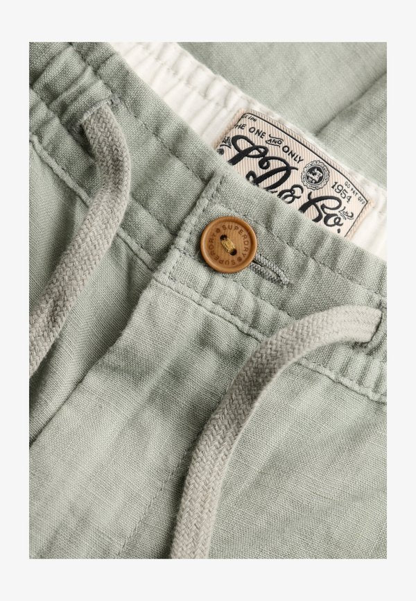 Superdry & Co M7011509A . - Trousers - vert