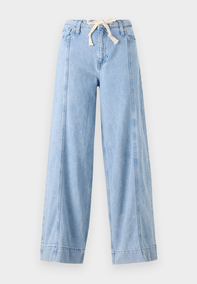 Helle blaue weit geschnittene Jeans aus Denim, mit einem Kordelzugbund und vertikalen Nähten an den Seiten.