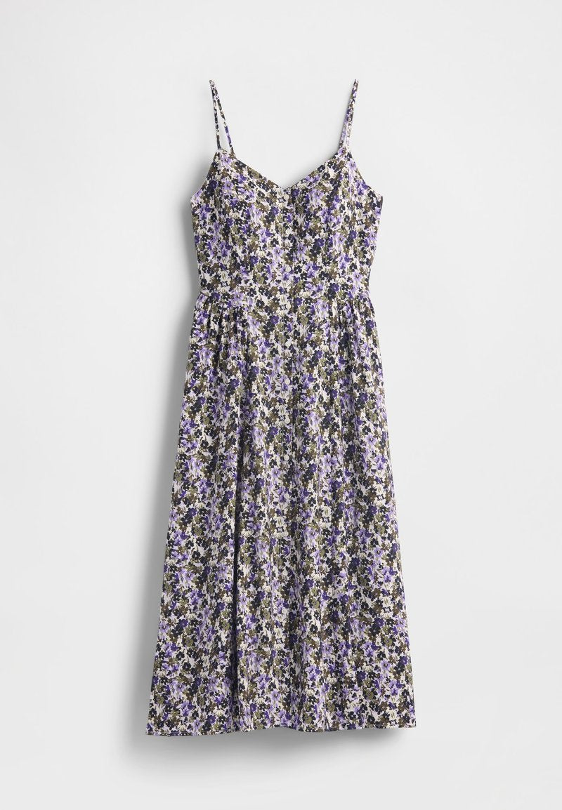 Blumenkleid mit dünnen verstellbaren Trägern, mit kleinem lila-schwarzem Blumenmuster auf hellem Hintergrund, fließender Stoff, A-Linien-Silhouette.