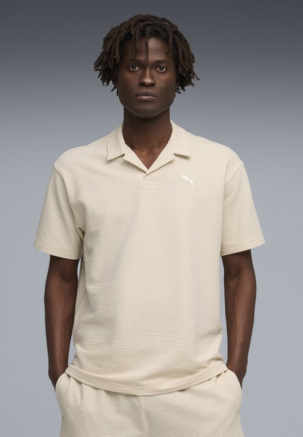 Puma ESSENTIALS ELEVATED POLO - Polo shirt - alpine snow