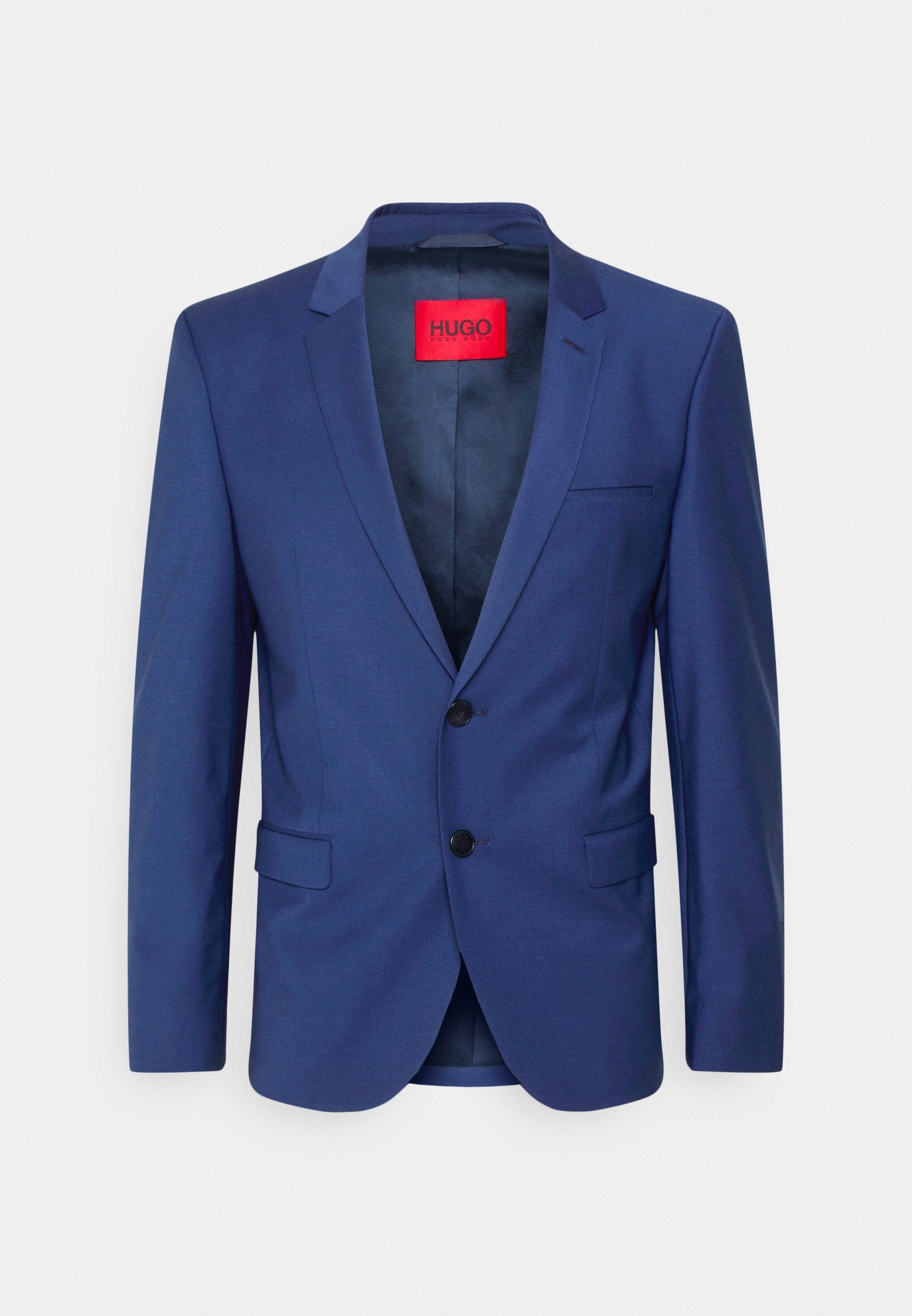 Marineblaues Sakko mit spitzen Revers, zwei Knöpfen und Klappentaschen. Innen mit rotem Markenlabel ausgestattet, durchgehend glatte Textur.