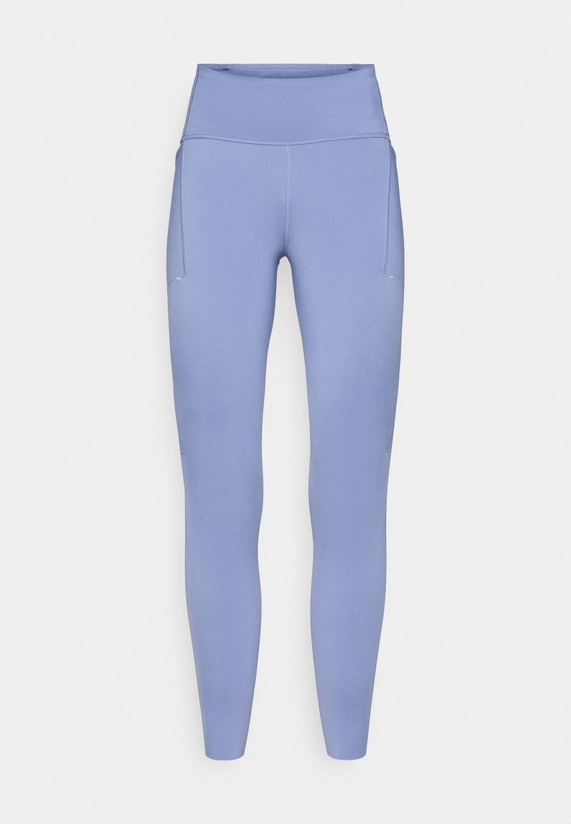 Helle lilafarbene High-Waist Leggings aus dehnbarem Material, mit einer glatten Textur und seitlicher Tasche. Nahtloses Design am Bund.