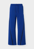 Nike Performance NIKECOURT ADVANTAGE - Tracksuit bottoms - old royal/white