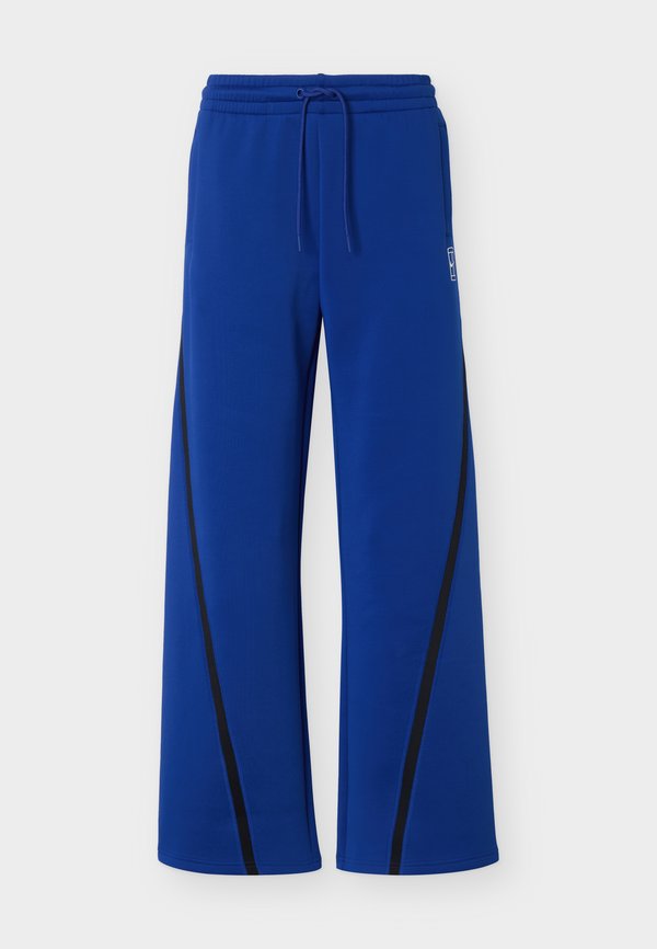 Nike Performance NIKECOURT ADVANTAGE - Tracksuit bottoms - old royal/white