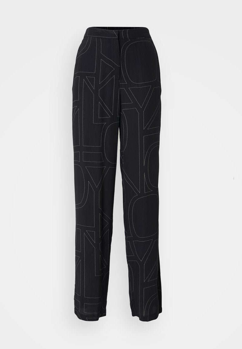 Schwarze Hose mit einem strukturierten Design aus großen Buchstaben in einer kontrastierenden Farbe, in lässigem Schnitt und mit weitem Bein. Sichtbarer elastischer Bund.
