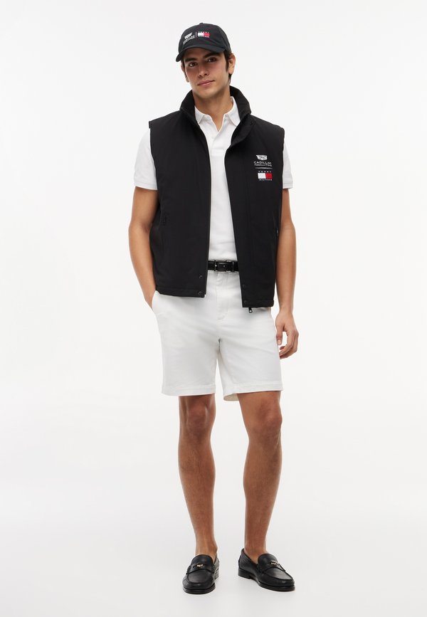 Tommy Hilfiger TH X CADILLAC FORMULA 1 TEAM LOGO GILET UNISEX - Waistcoat - black