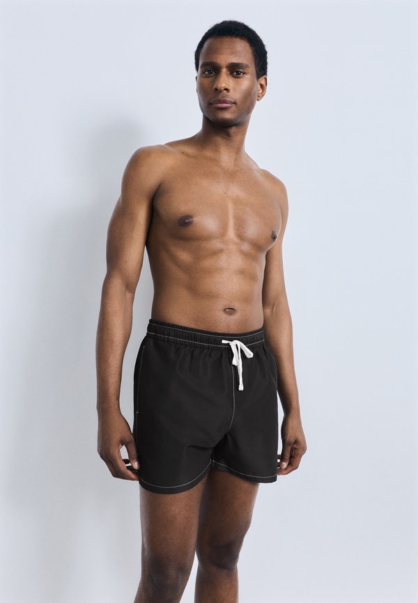 Tommy Hilfiger HERITAGE LOGO MID LENGTH  - Swimming shorts - black