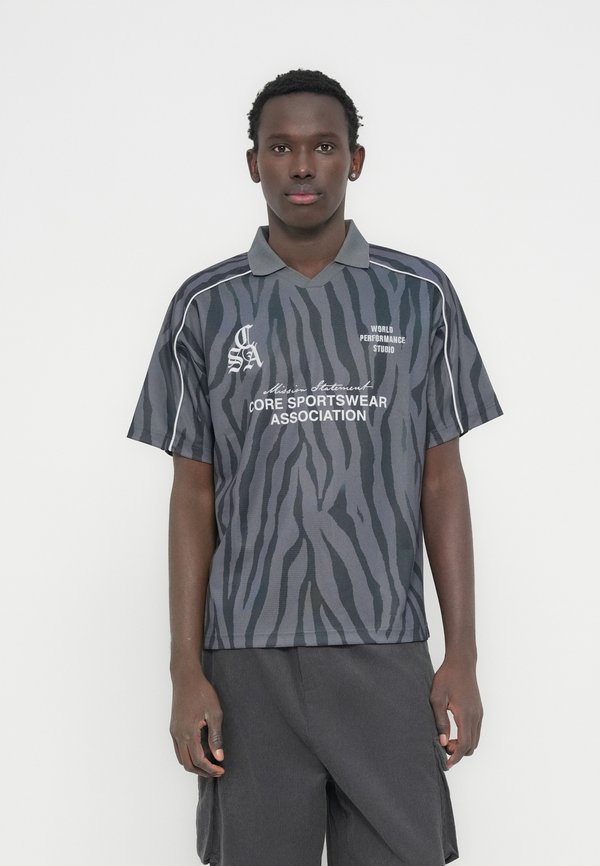 Jack & Jones JCODUST PIPING FOOTBALL OPEN COLLAR - Polo shirt - black