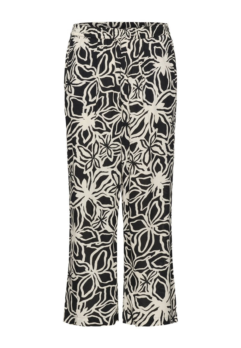 Schwarz-weiße, floral gemusterte weite Hosen mit elastischem Bund, aus leichtem Stoff und mit glatter Textur.
