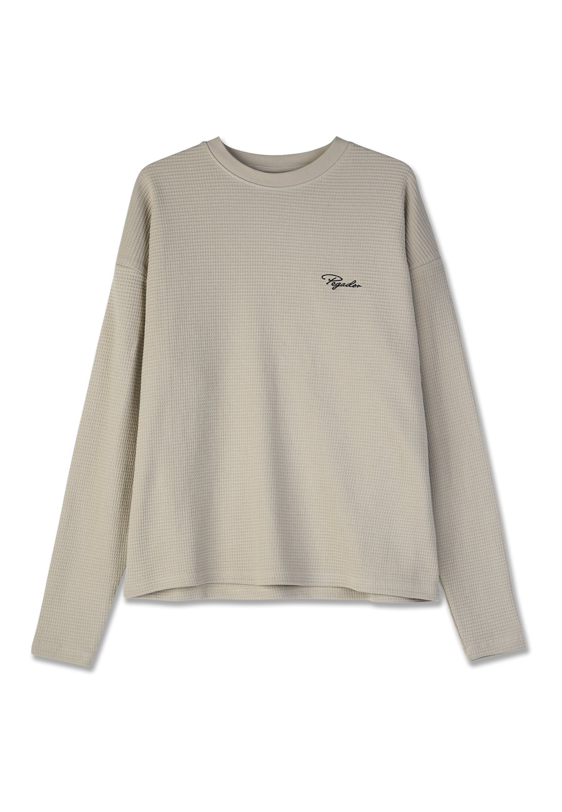 Beige Longsleeve-Shirt aus strukturiertem Waffelstrick mit rundem Halsausschnitt und gesticktem "Pegador"-Logo auf der linken Brust.
