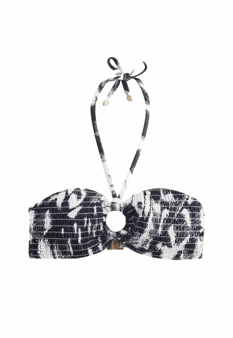 Schwarzer und weißer gestreifter Bikini-Oberteil mit geschmücktem Design, zentralem Ringakzent und Bindebändern. Glatte Textur über die gesamte Fläche.