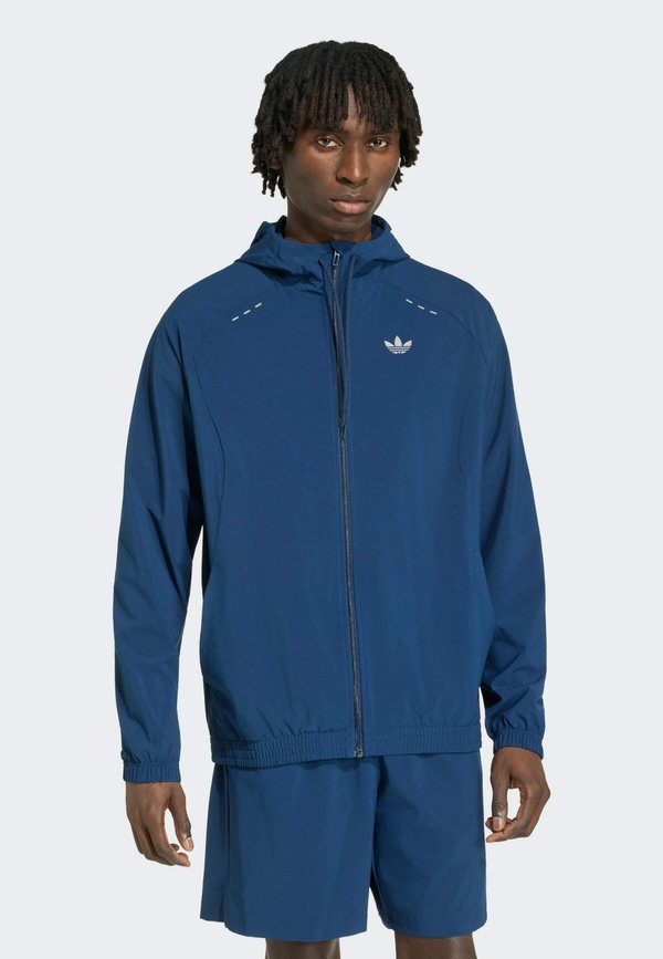 adidas Originals TECH ESS TT - Training jacket - night indigo