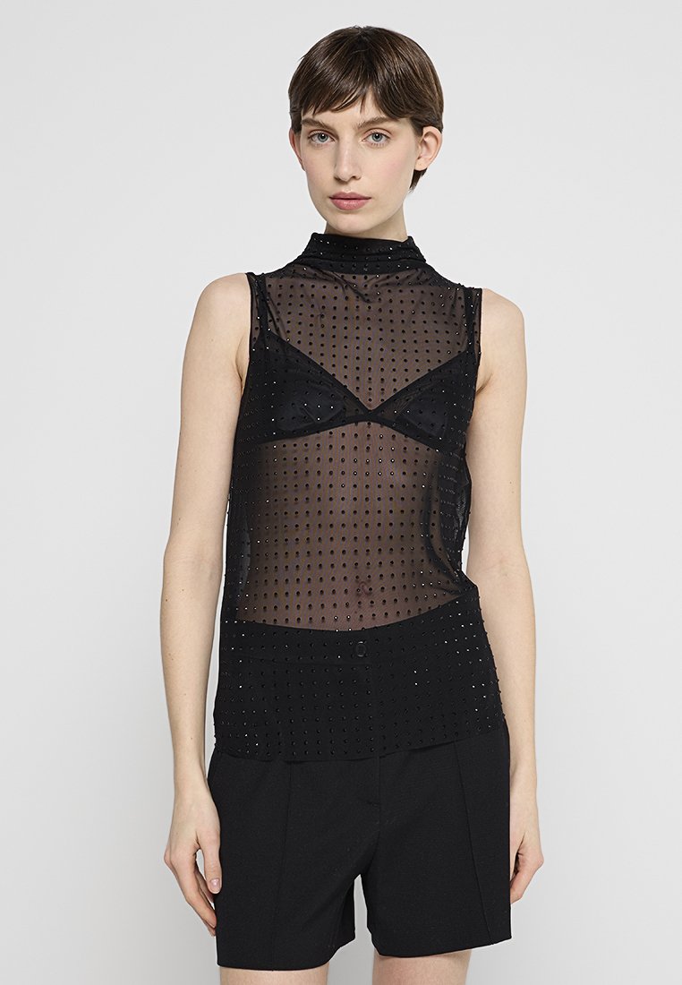 Schwarzes ärmelloses Top mit einem transparenten Mesh-Design und gepunkteten Mustern, hohem Kragen und subtilen metallischen Akzenten am Saum.