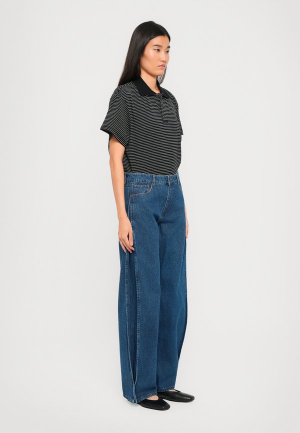 DESIGNERS REMIX MILES BARRELL JEANS