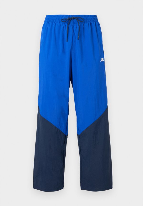 New Balance SPORT LEGACY PANT - Tracksuit bottoms - navy/galaxy blue