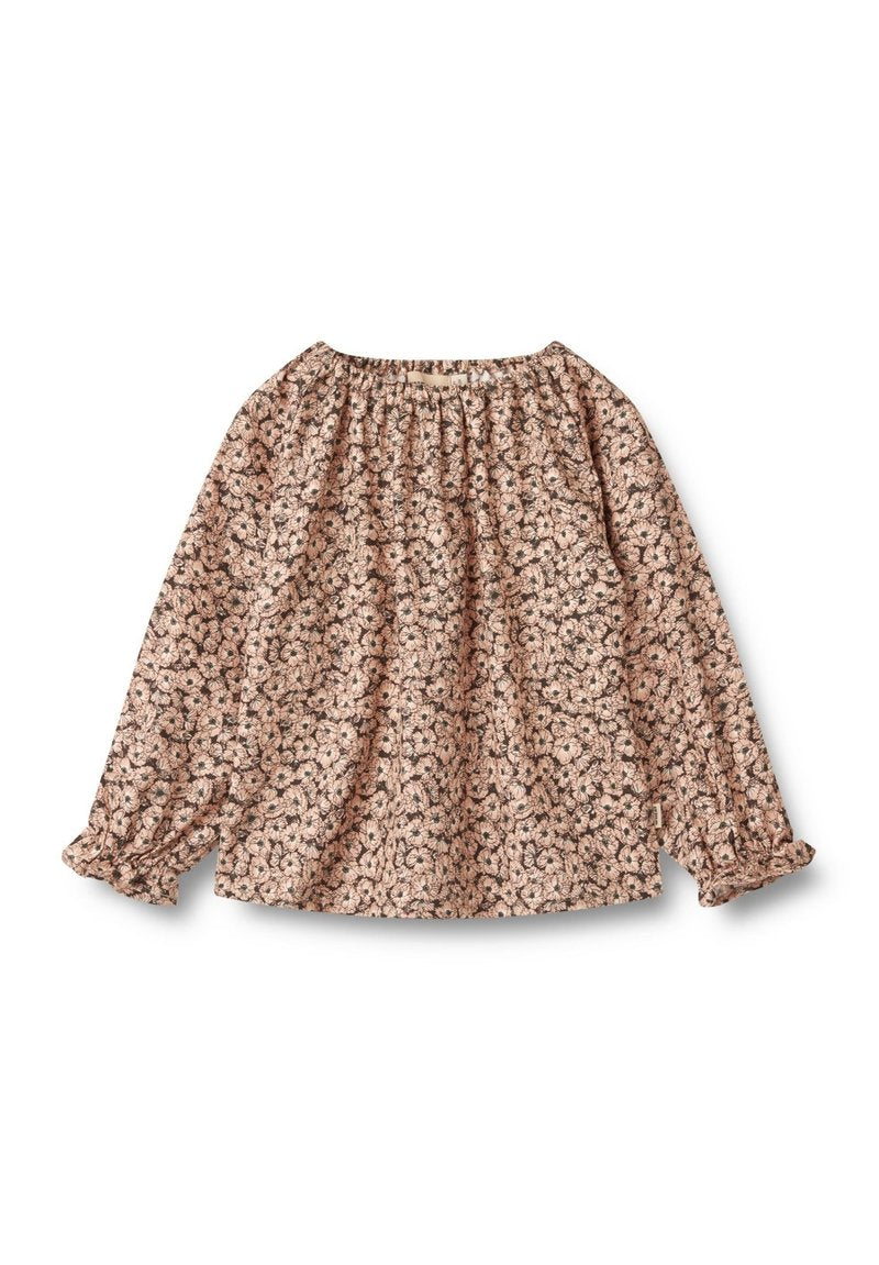 Langärmlige Bluse im pinken Blumenmuster, aus leichtem Stoff gefertigt. Mit einem gerafften Ausschnitt und elastischen Bündchen für eine entspannte Passform.