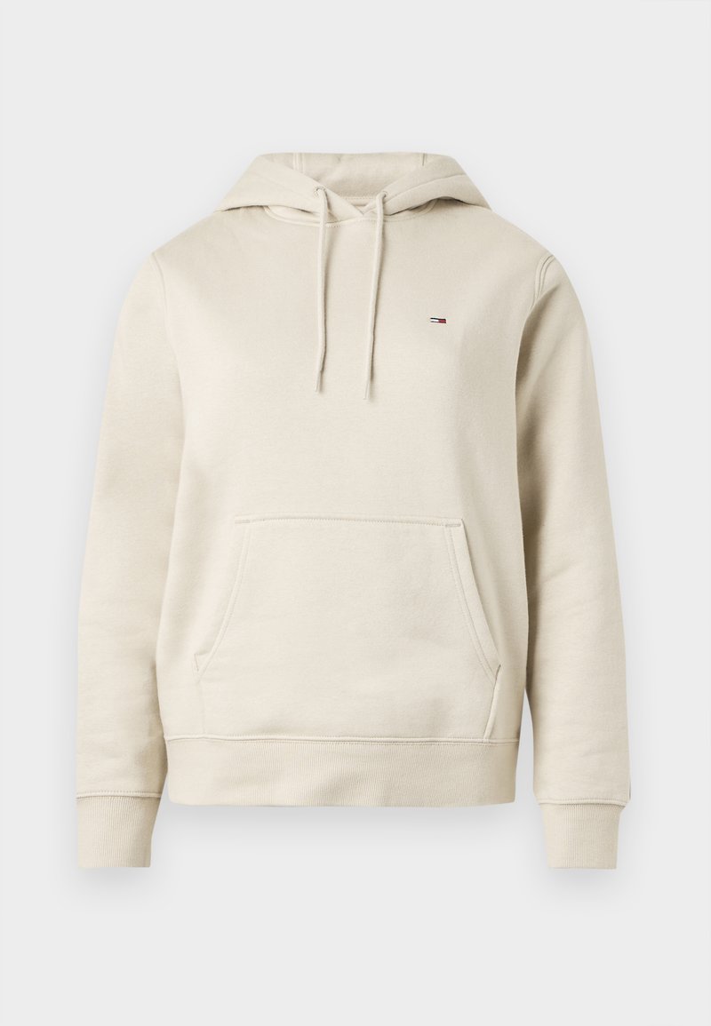 Hoodie in Cremefarbe aus weicher Baumwolle. Verfügt über eine Kängurutasche, eine Kapuze mit Kordelzug und ein kleines Logo auf der Brust. Gerippte Bündchen an Ärmel und Saum.