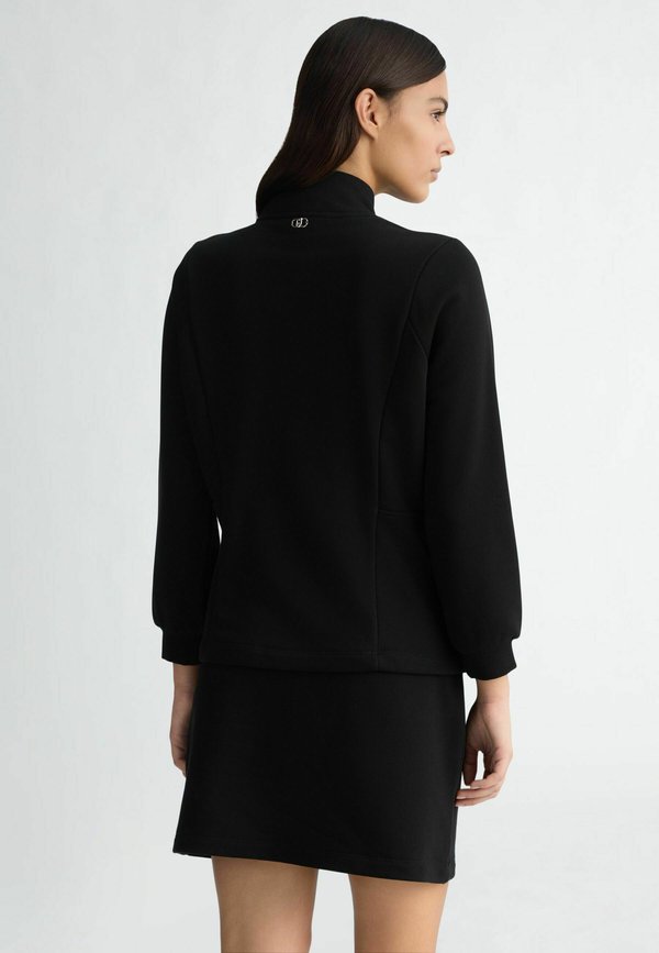 LIU JO WITH ZIP AND RHINESTONES