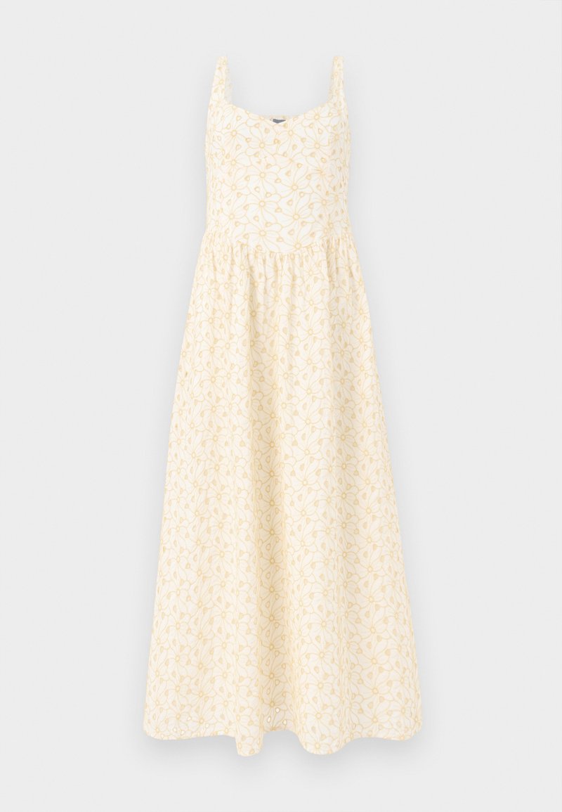 Ärmelloses langes cremefarbenes Kleid mit hellgelbem Blumenmuster und geraffter Taille.