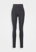 Under Armour MERIDIAN - Leggings - black