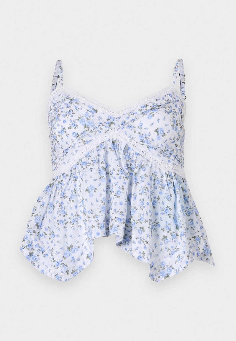 Hellblaues Blumenshirt mit dünnen Trägern, Spitzenbesatz und ausgestelltem Saum. Der Stoff wirkt weich mit einem zarten Blumenmuster.