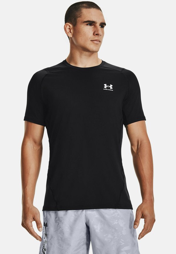 Under Armour FITTED - Sports T-shirt - black