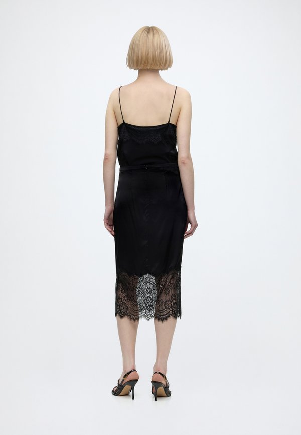 Good American SLIP MIDI SKIRT