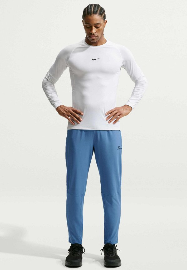 Nike Performance M NP DF NPT PANT - Tracksuit bottoms - indigo storm black