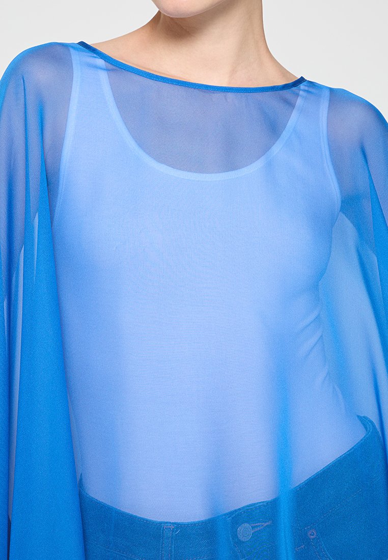 comma Cape Media 3