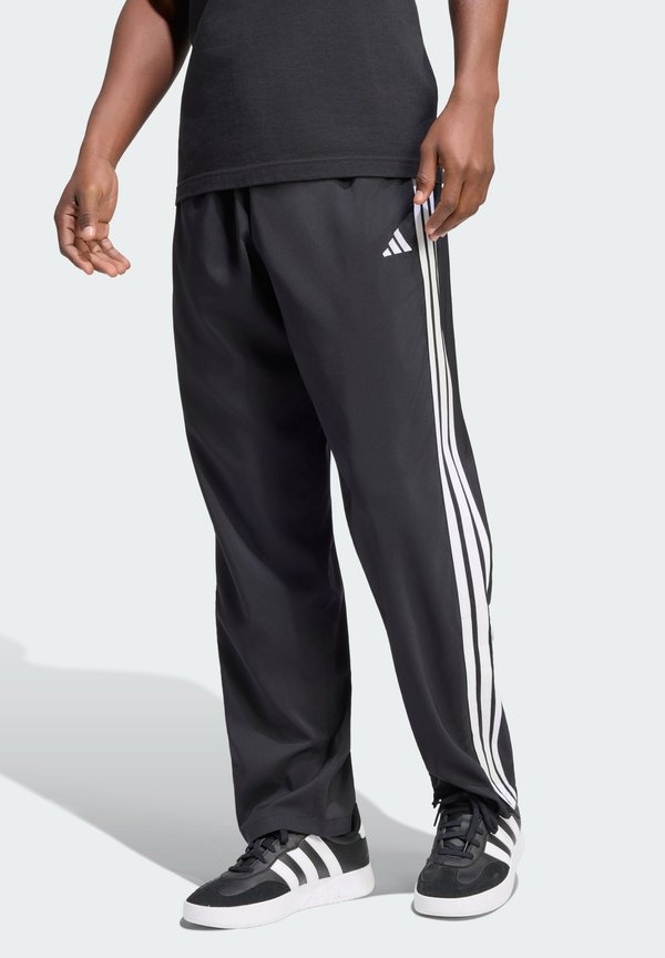 adidas Sportswear ESSENTIALS 3 STRIPES STANFORD LITE TAPERED OPEN HEM PANTS - Tracksuit bottoms - black/white