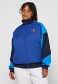 Blazer in Blau mit türkisfarbenen und marineblauen Akzenten, Reißverschluss, langen Ärmeln, Logo auf der Brust und praktischen seitlichen Taschen.