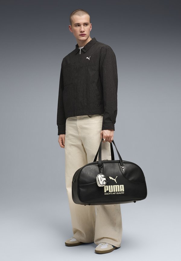 Puma CHORE - Light jacket - black