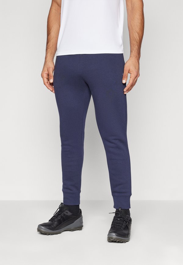Calvin Klein Golf PLANET JOGGER - Tracksuit bottoms - navy