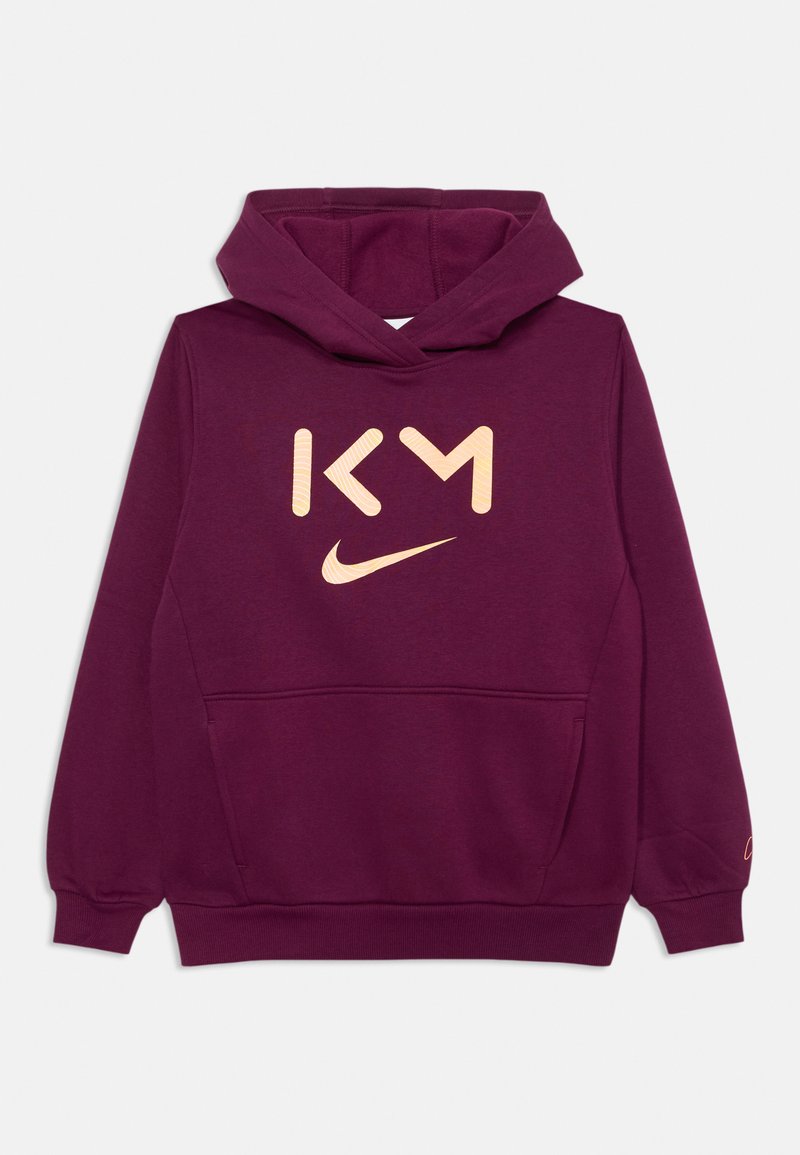 Burgunderfarbener Hoodie mit einer vorderen Kängurutasche, gerippten Bündchen und einem großen beigen Logo mit "KM" und dem Nike-Swoosh auf der Brust.