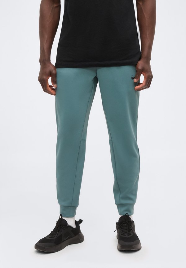 Nike Performance FLEX - Tracksuit bottoms - mineral slate/black