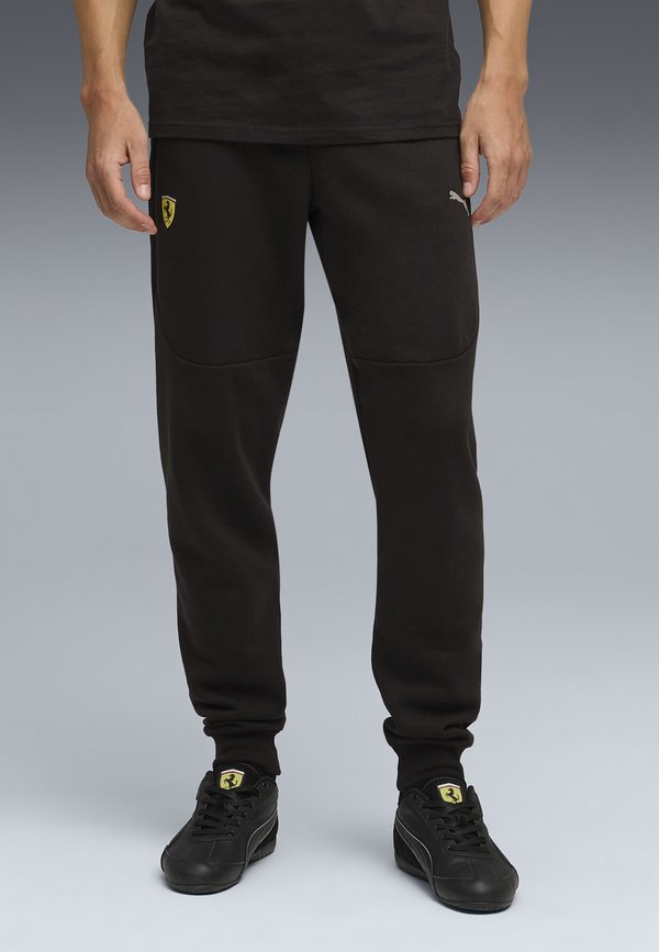 Puma Tracksuit bottoms - black